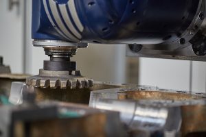 vertical milling machine close up processes a part