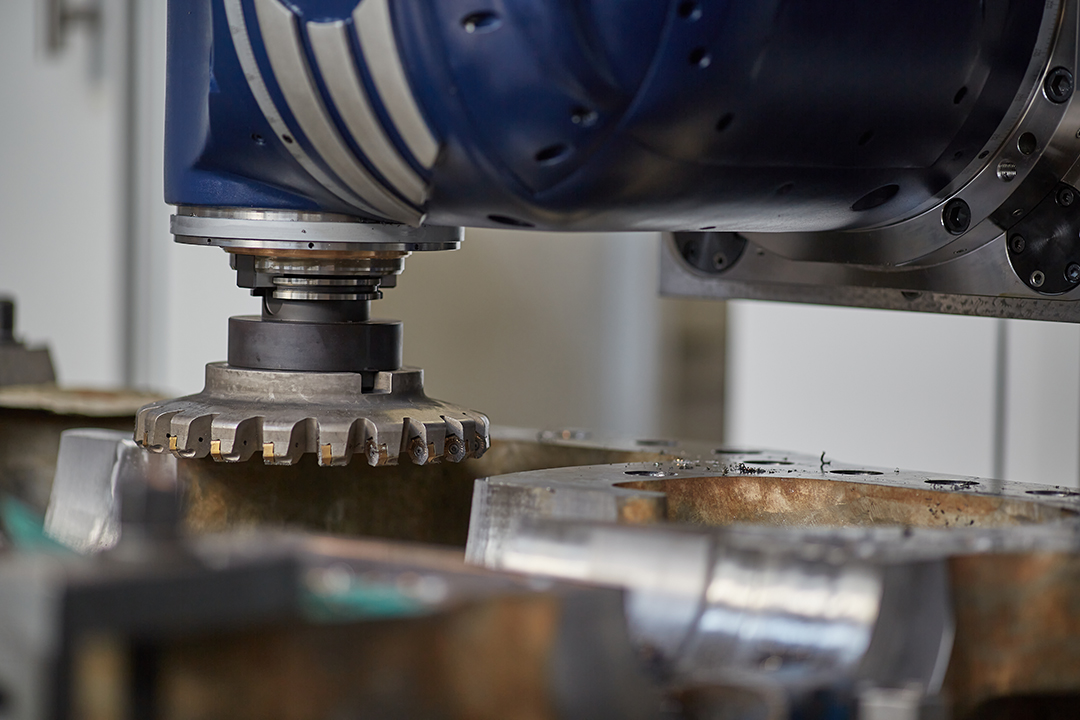 vertical milling machine close up processes a part